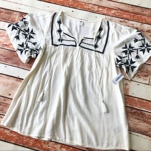 New with tags size XS shirt.